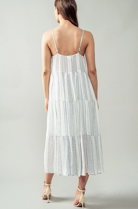 Women's spaghetti strap tiered midi sun dress, blue and white stripe, back view