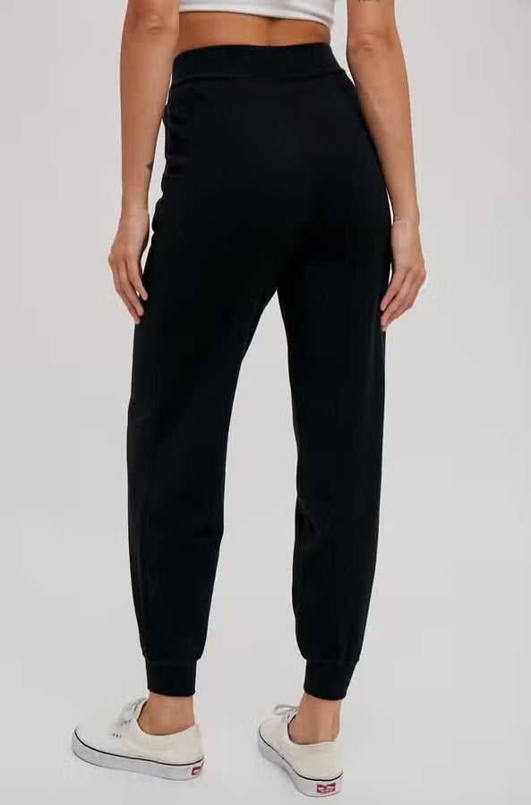 Women's sweater knit jogger pants, black, back view