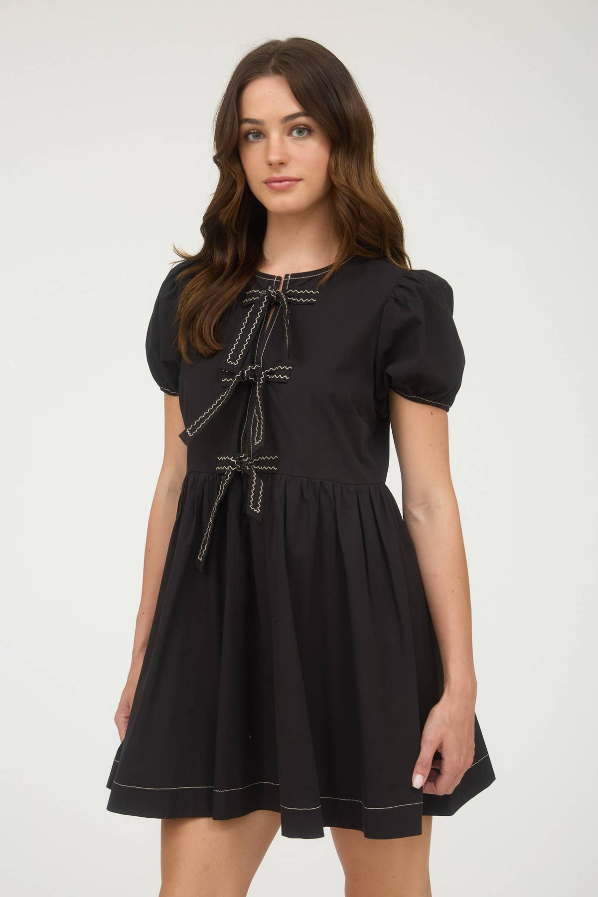 Women's front tie puff sleeve babydoll mini dress, black, front angle