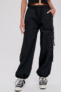 Women's parachute cargo pants, black, front view
