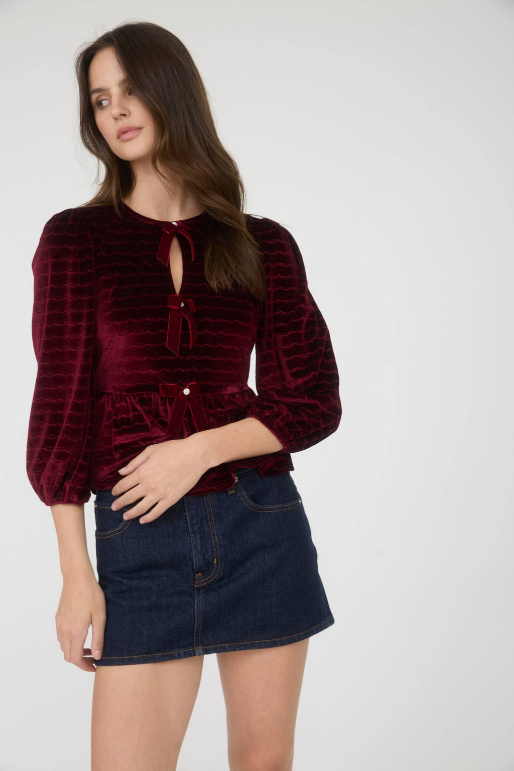 Women's velvet peplum top with pearl buttons, burgundy, front with skirt