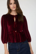 Women's velvet peplum top with pearl buttons, burgundy, front view