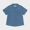 Front of boys blue denim button down shirt, short sleeves with one front pocket