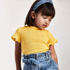 3008 Girl Wearing Smocked Mustard T-Shirt, Short Sleeved