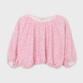 6186 Mayoral Girls Pink and White Polka Dotted Loose Shirt, Long Sleeve, Slight off the shoulder, front