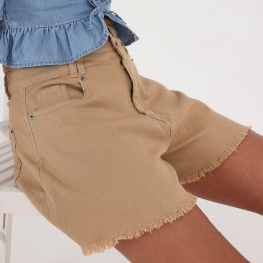 Mayoral girls high waisted twill shorts, ocher clay, styled on model