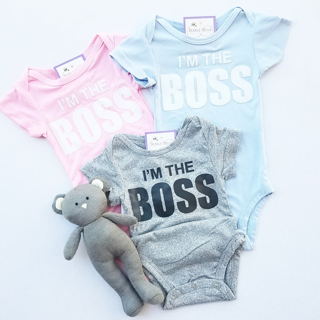 I'm The Boss baby bodysuit, snapsuit, onepiece, baby blue, heather grey, pink