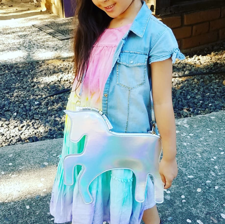 little girls denim top and unicorn purse