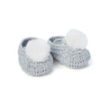 Crochet baby booties with pompom, top view