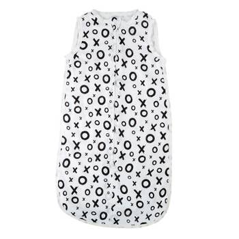 Sleepsack that fits 0-9 months; white with black XO lettering all over sleep sack.