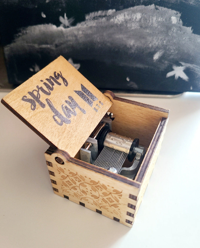 Spring Day wooden hand crank music box, side view