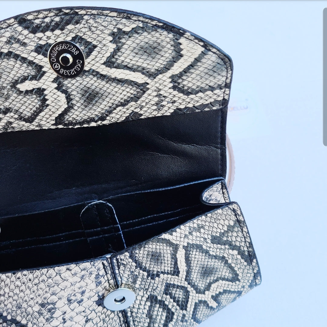 Faux snakeskin fanny pack belt bag, black and tan, inside view