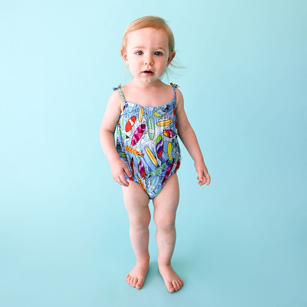 Posh Peanut bamboo bubble romper, waves surfboards, worn by toddler