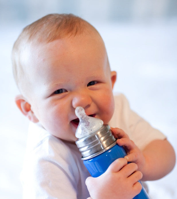 Pura vented silicone bottle nipples, baby drinking from bottle